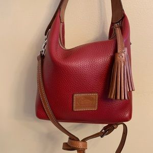 Dooney & Bourke pebble red handbag with crossbody strap